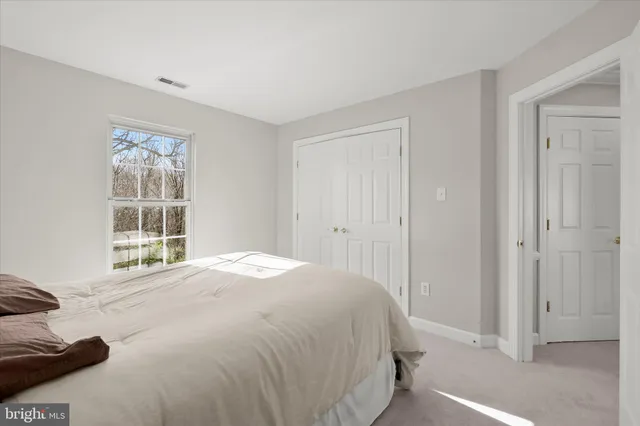 a sign that is in front of flowers