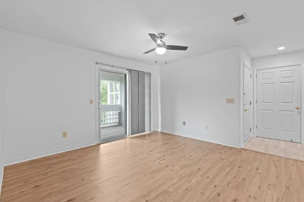 a view of kitchen with wooden floor