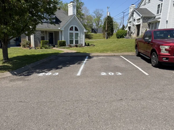 a view of street with parked cars