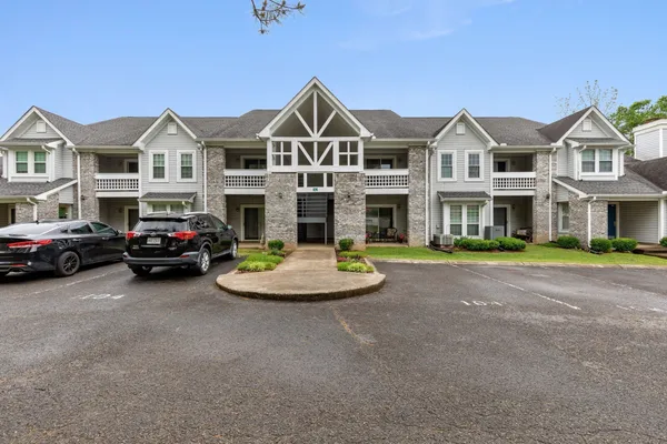 a view of a town with brick walls and many windows