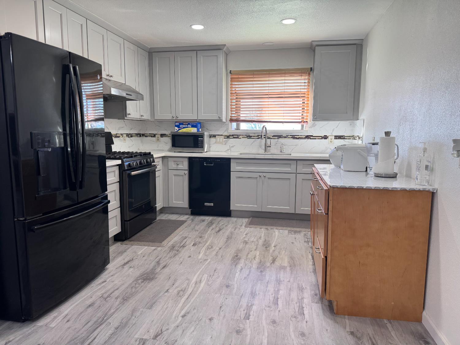 1420 Mt Ida Road Oroville, CA 95966 - Photo 12 of 37 a kitchen with a refrigerator stove and sink