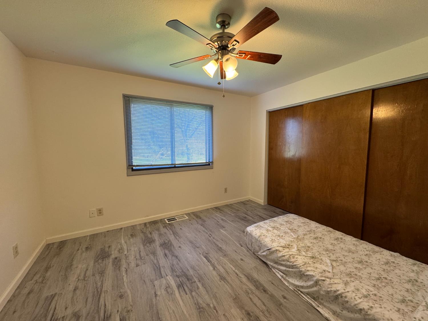 1420 Mt Ida Road Oroville, CA 95966 - Photo 16 of 37 a view of empty room with wooden floor