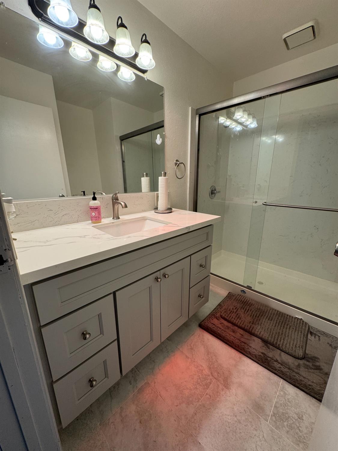 1420 Mt Ida Road Oroville, CA 95966 - Photo 17 of 37 a bathroom with a sink double vanity and a mirror
