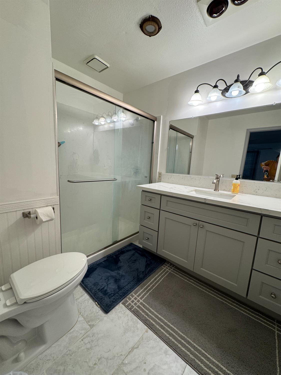 1420 Mt Ida Road Oroville, CA 95966 - Photo 18 of 37 a bathroom with a sink a toilet a mirror and shower