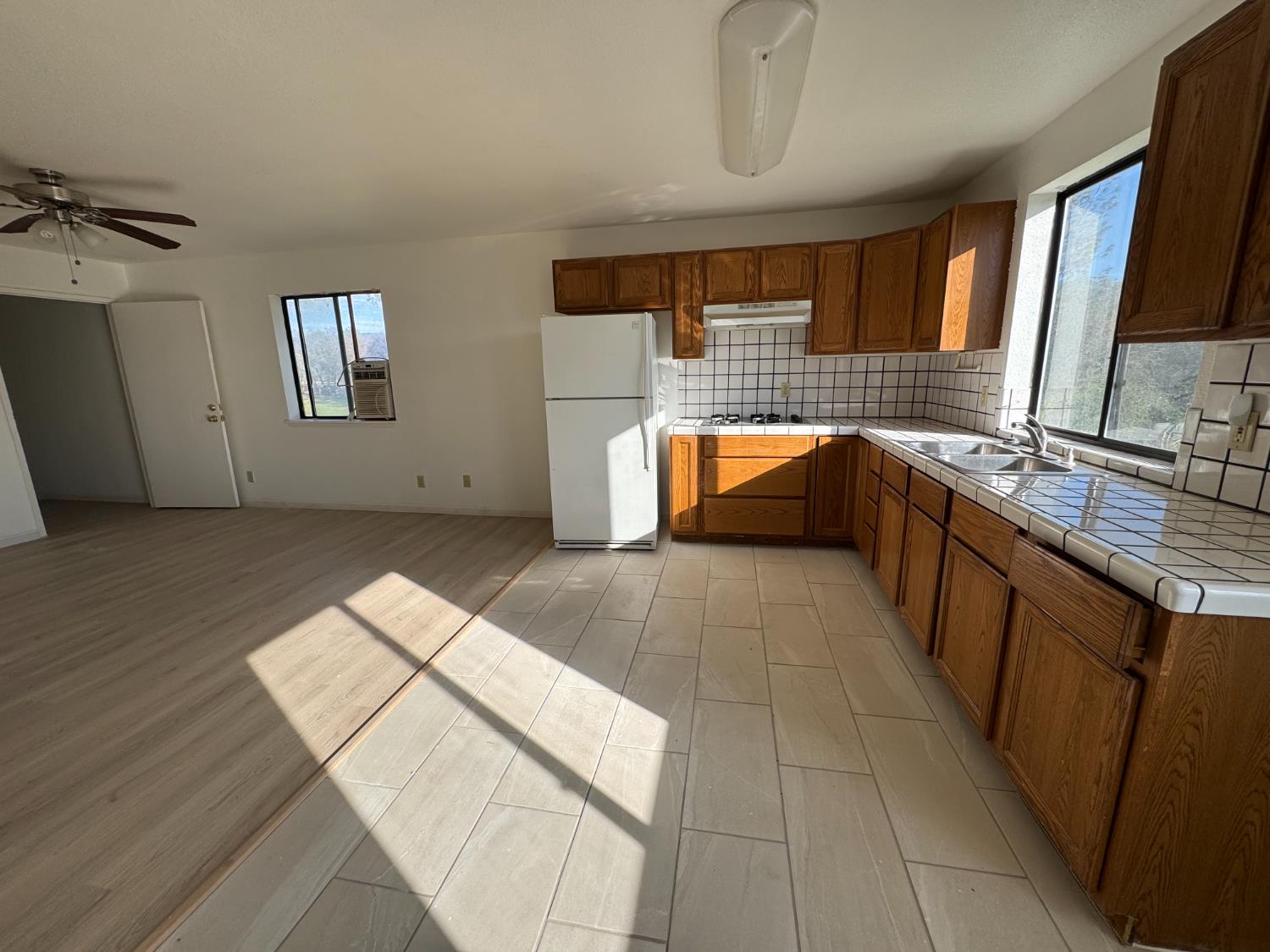1420 Mt Ida Road Oroville, CA 95966 - Photo 21 of 37 a kitchen with stainless steel appliances a sink stove and cabinets