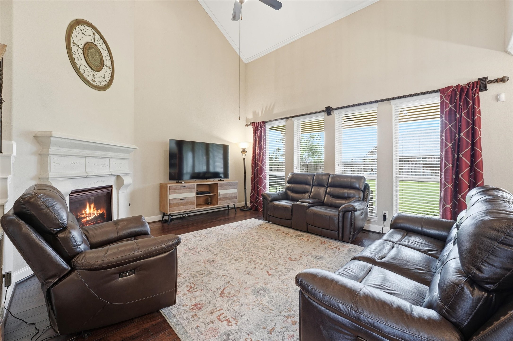 12506 Northpointe Ridge Lane Tomball, TX 77377 - Photo 11 of 31 a living room with furniture a large window and a fireplace