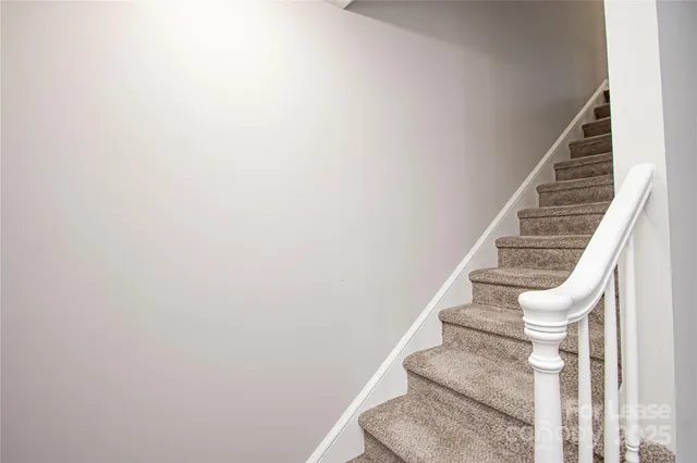 a view of entryway with a front door