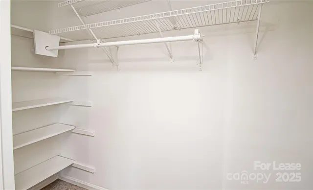 a view of a room that has a window in it