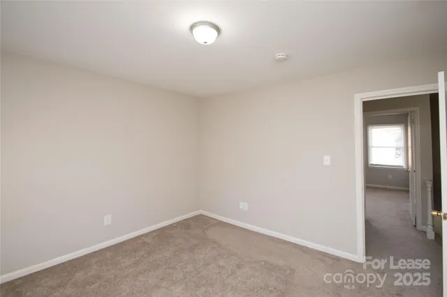 a bathroom with a sink toilet a mirror and shower