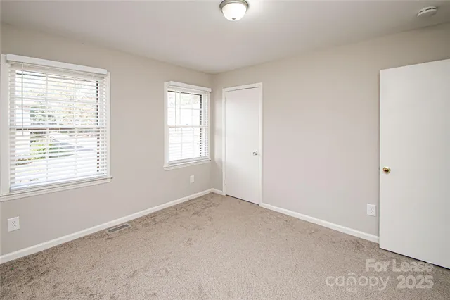 a view of a street in front of a building