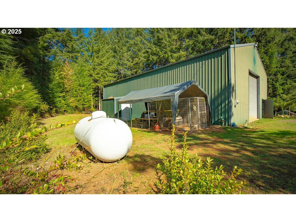 63450 Fairview Road Coquille, OR 97423 - Photo 24 of 37 a sink and a yard in front of the house