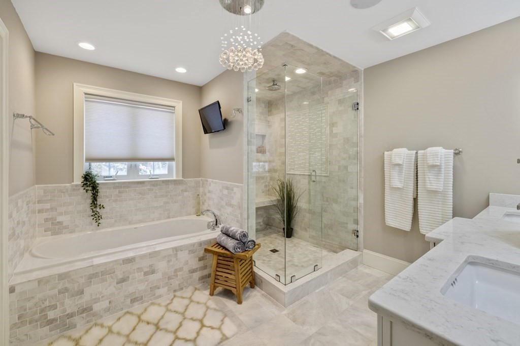 27 Webster Road Lexington, MA 02421 - Photo 24 of 42 a spacious bathroom with a tub shower and sink