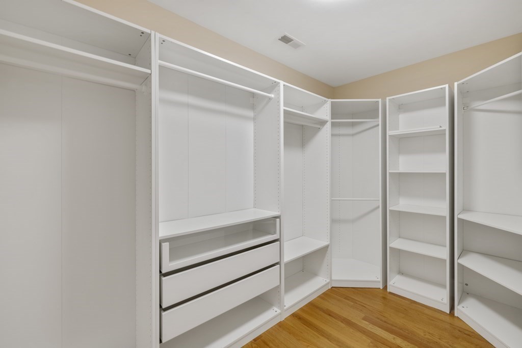 27 Webster Road Lexington, MA 02421 - Photo 25 of 42 a view of an empty walk in closet