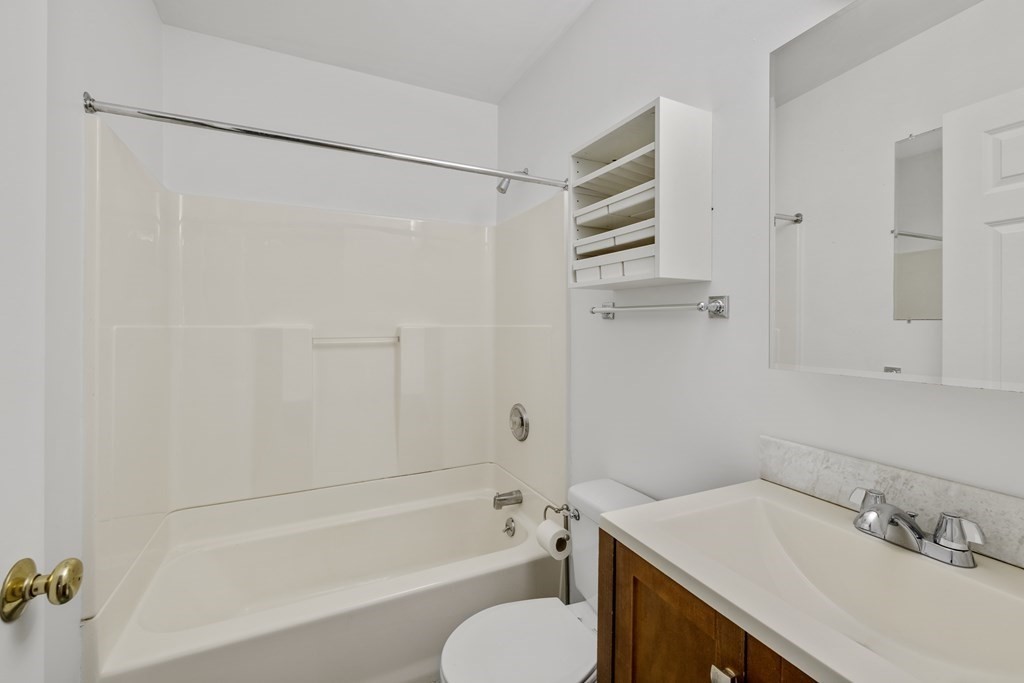 27 Webster Road Lexington, MA 02421 - Photo 35 of 42 a bathroom with a sink toilet and shower