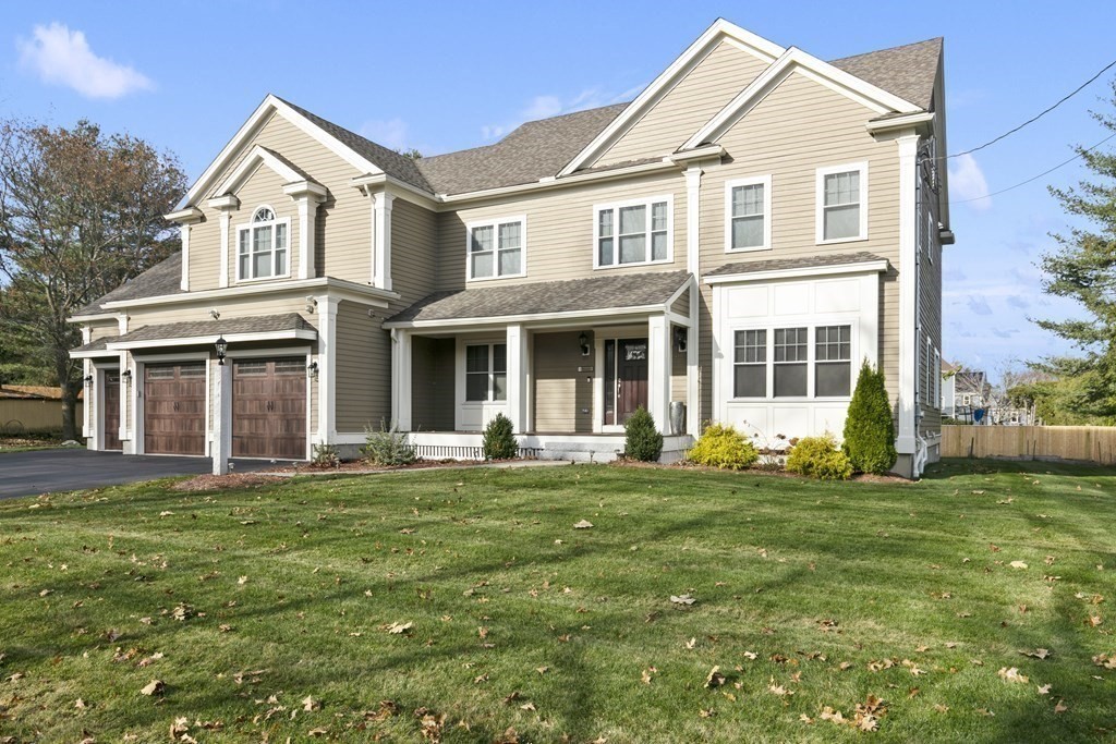 27 Webster Road Lexington, MA 02421 - Photo 40 of 42 front view of a house with a yard