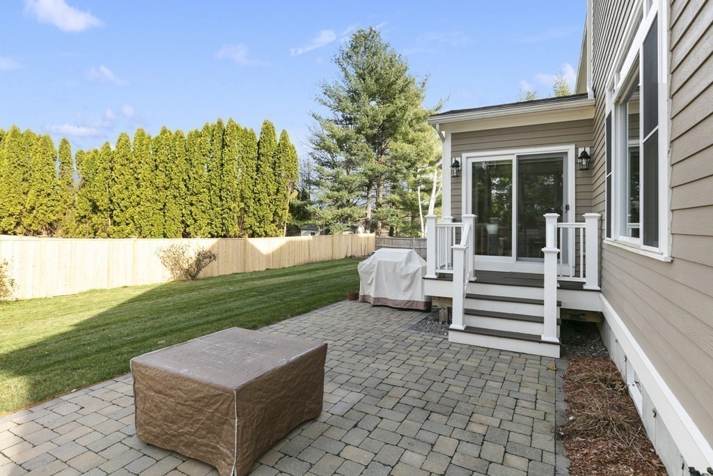 27 Webster Road Lexington, MA 02421 - Photo 42 of 42 a view of a couches in the backyard of the house