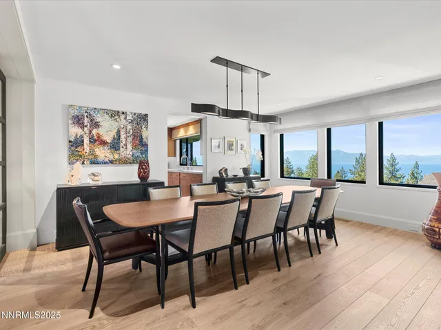 a bedroom with a bed and view of living room