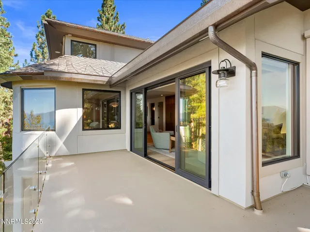 a bathroom with a toilet and shower