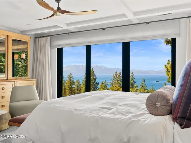 a bathroom with a sink a mirror and a shower