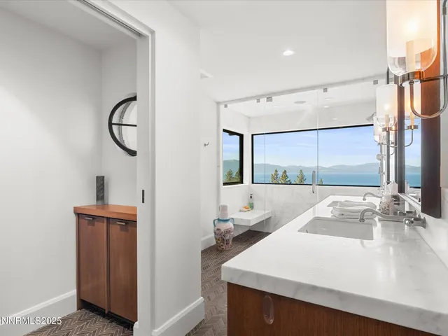 a view of a chairs and table in patio