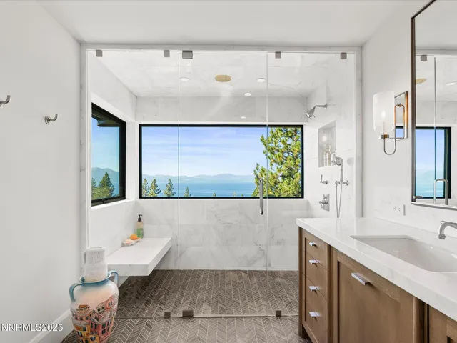 a view of a patio with table and chairs with wooden floor
