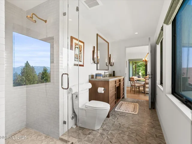 a outdoor living space with furniture and a potted plant