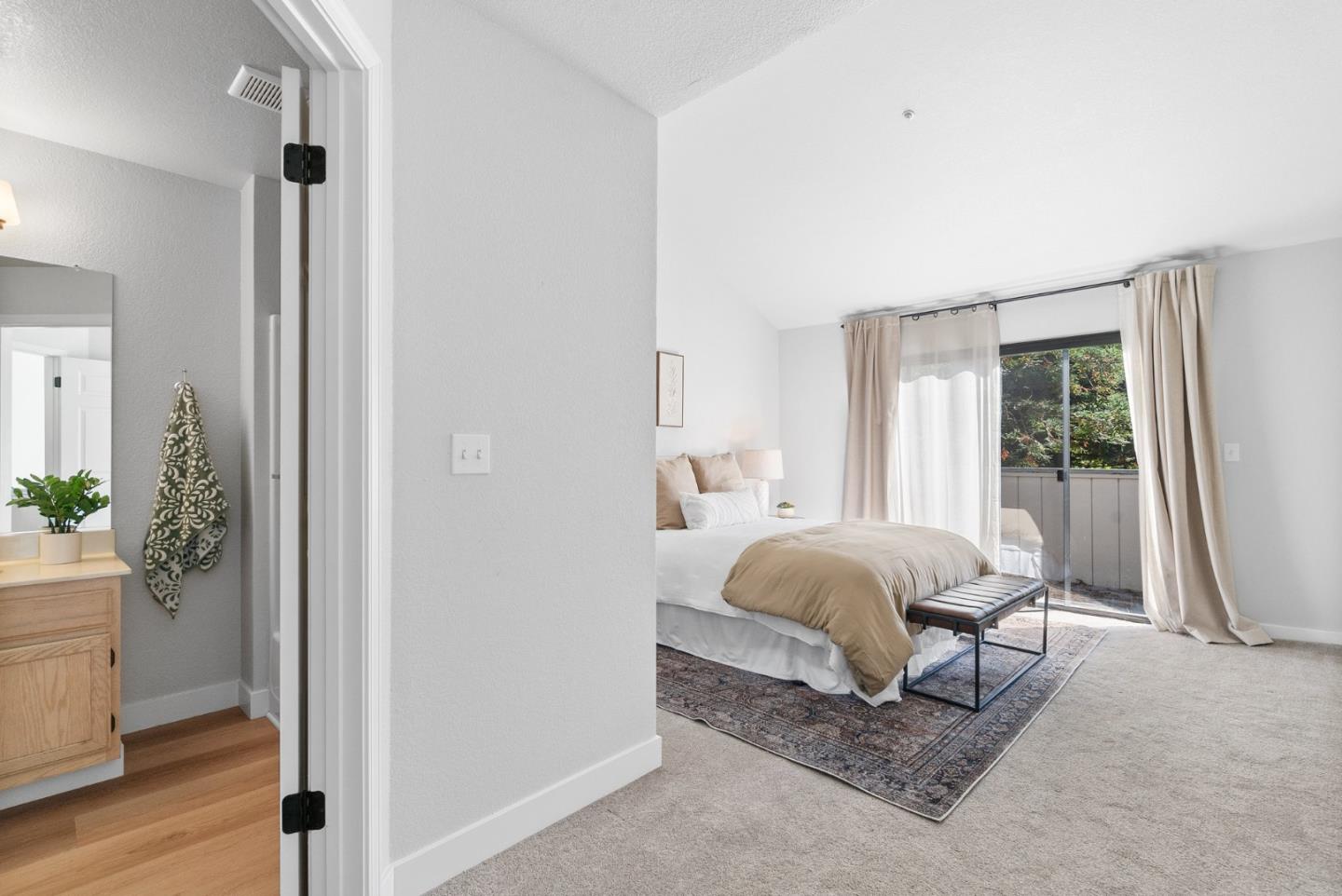 355 Village Creek Road Aptos, CA 95003 - Photo 18 of 41 a bedroom with a bed and a potted plant