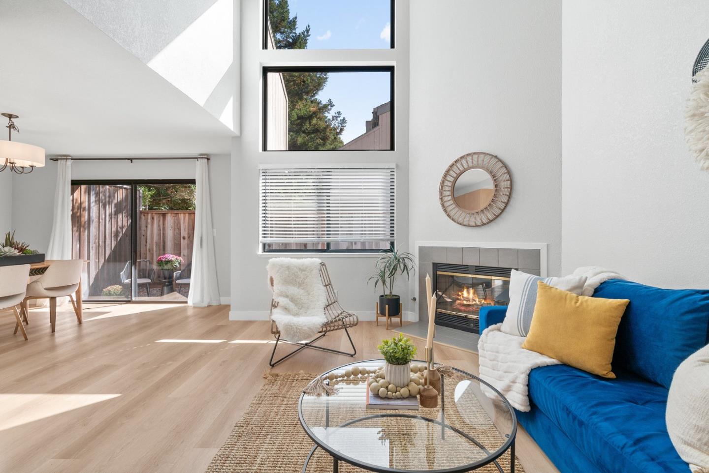 355 Village Creek Road Aptos, CA 95003 - Photo 2 of 41 a living room with furniture a clock and a fireplace