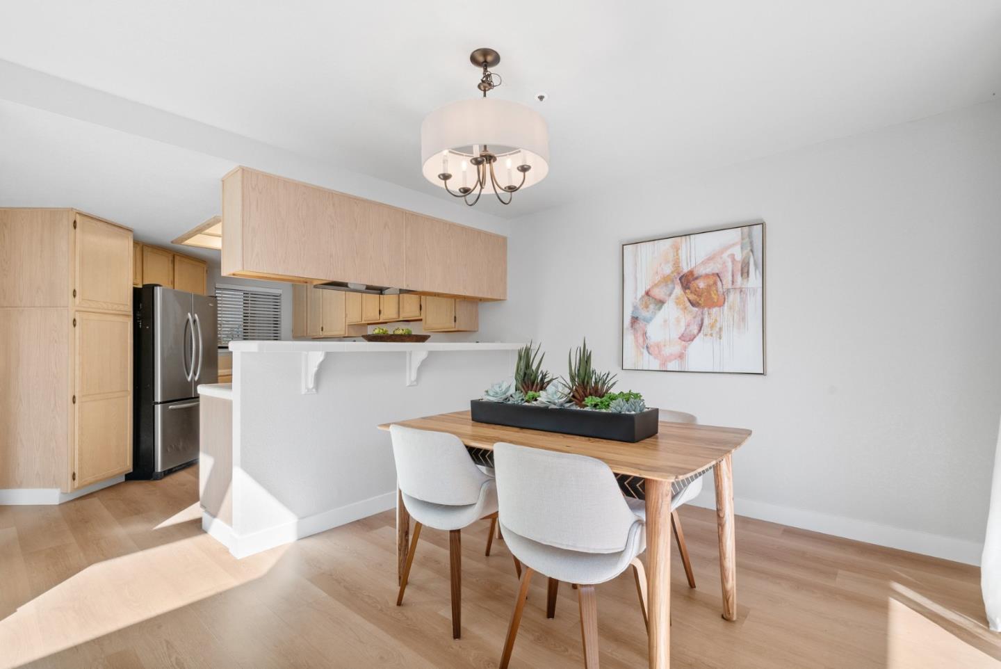 355 Village Creek Road Aptos, CA 95003 - Photo 8 of 41 a dining room with furniture a table and chairs