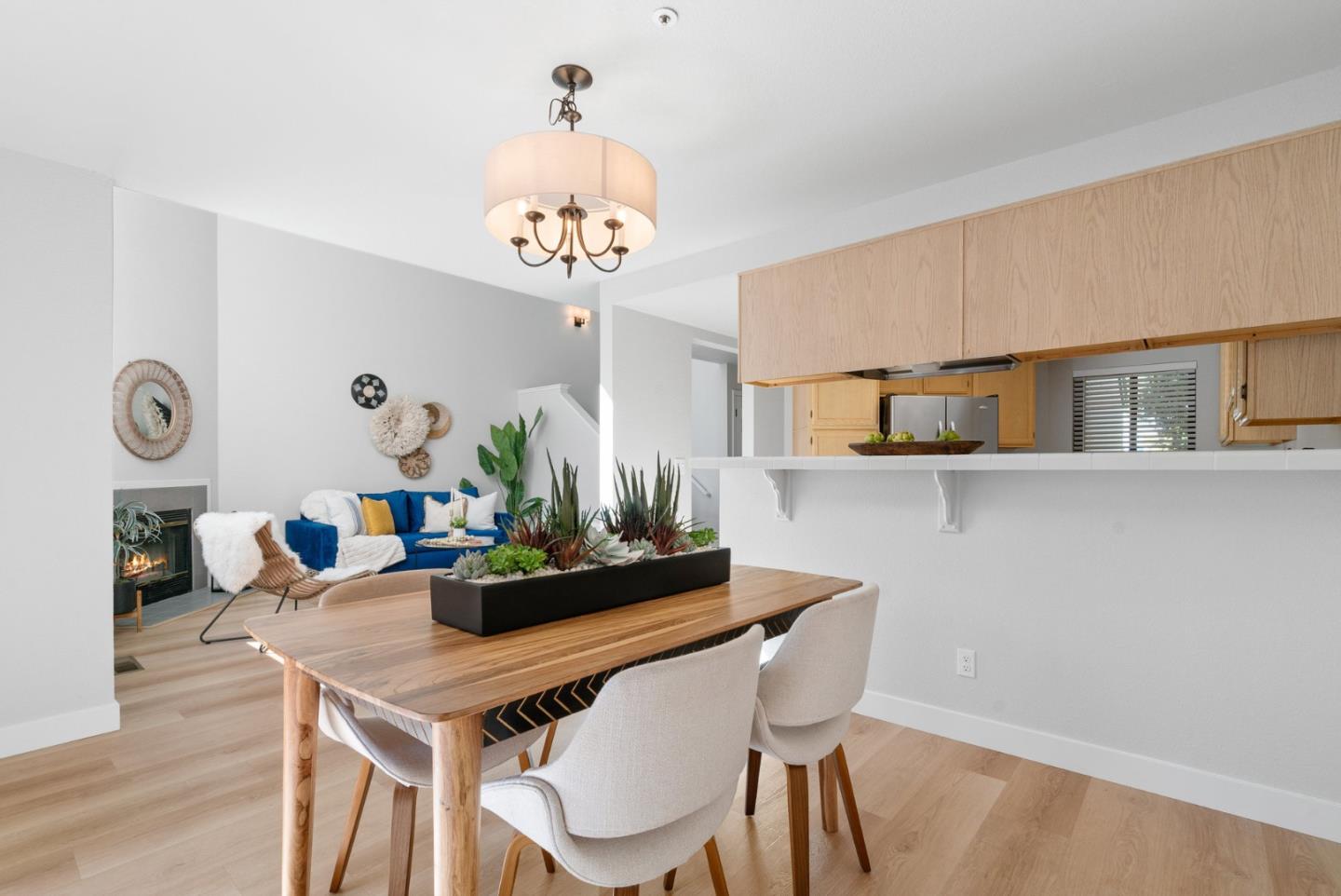 355 Village Creek Road Aptos, CA 95003 - Photo 9 of 41 a view of a dining room with furniture and chandelier