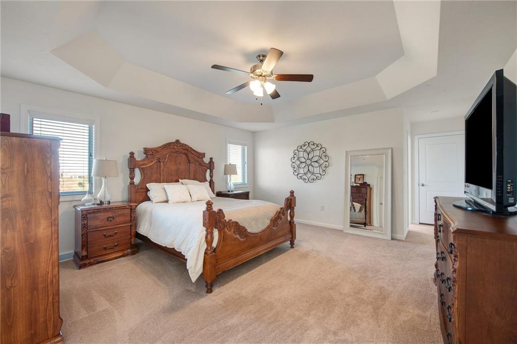 7372 Sierra Drive Irwin, PA 15642 - Photo 22 of 32 a bed room with bed and a flat tv screen on dresser