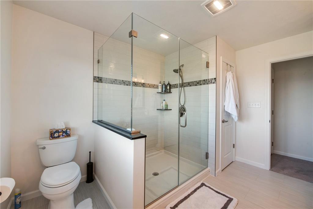 7372 Sierra Drive Irwin, PA 15642 - Photo 23 of 32 a bathroom with a shower toilet and sink