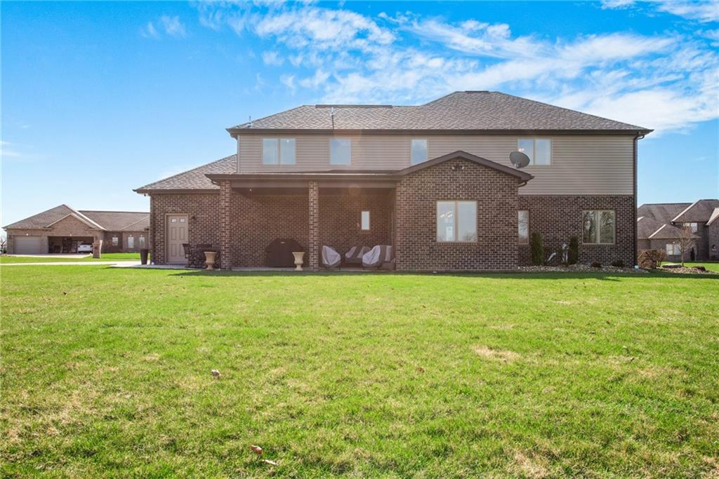 7372 Sierra Drive Irwin, PA 15642 - Photo 29 of 32 a front view of a house with garden