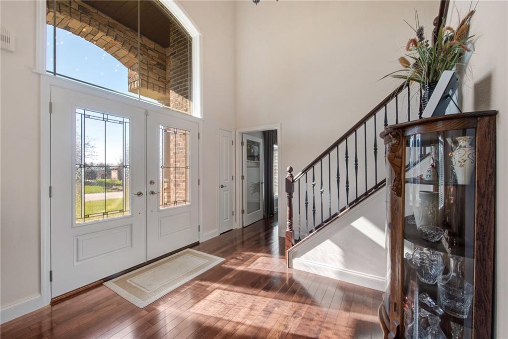 7372 Sierra Drive Irwin, PA 15642 - Photo 4 of 32 a view of an entryway with wooden floor and a livingroom view