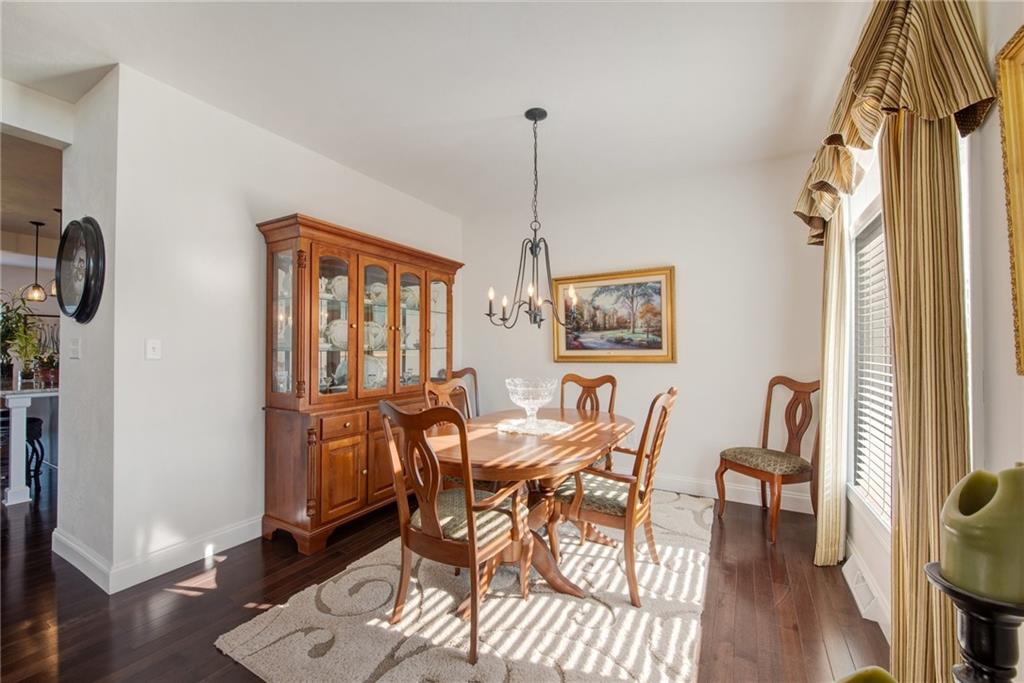 7372 Sierra Drive Irwin, PA 15642 - Photo 6 of 32 a view of a dining room with furniture window and wooden floor