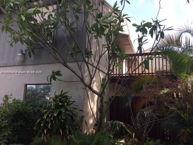 17 Crossings Circle, Unit E Boynton Beach, FL 33435 - Photo 6 of 20 a view of a house with a tree