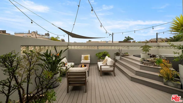 a room with furniture and a large window