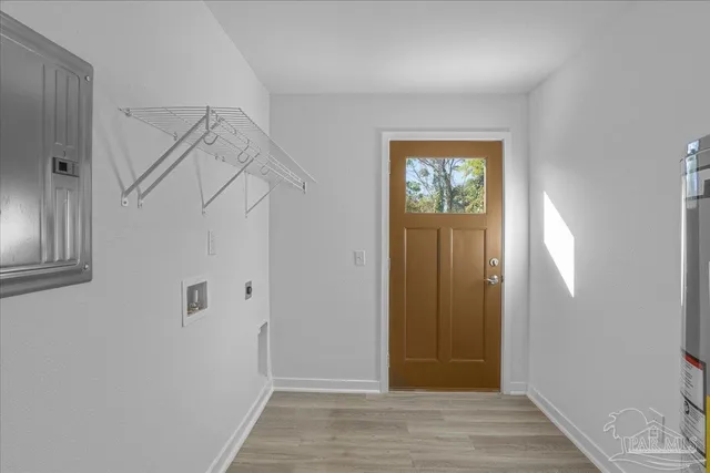 a view of entryway with wooden floor