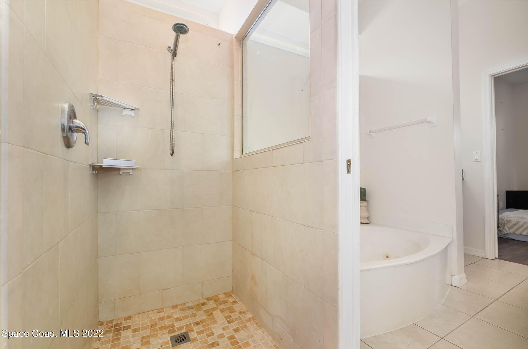 2364 Addington Circle Rockledge, FL 32955 - Photo 13 of 22 a bathroom with a bathtub