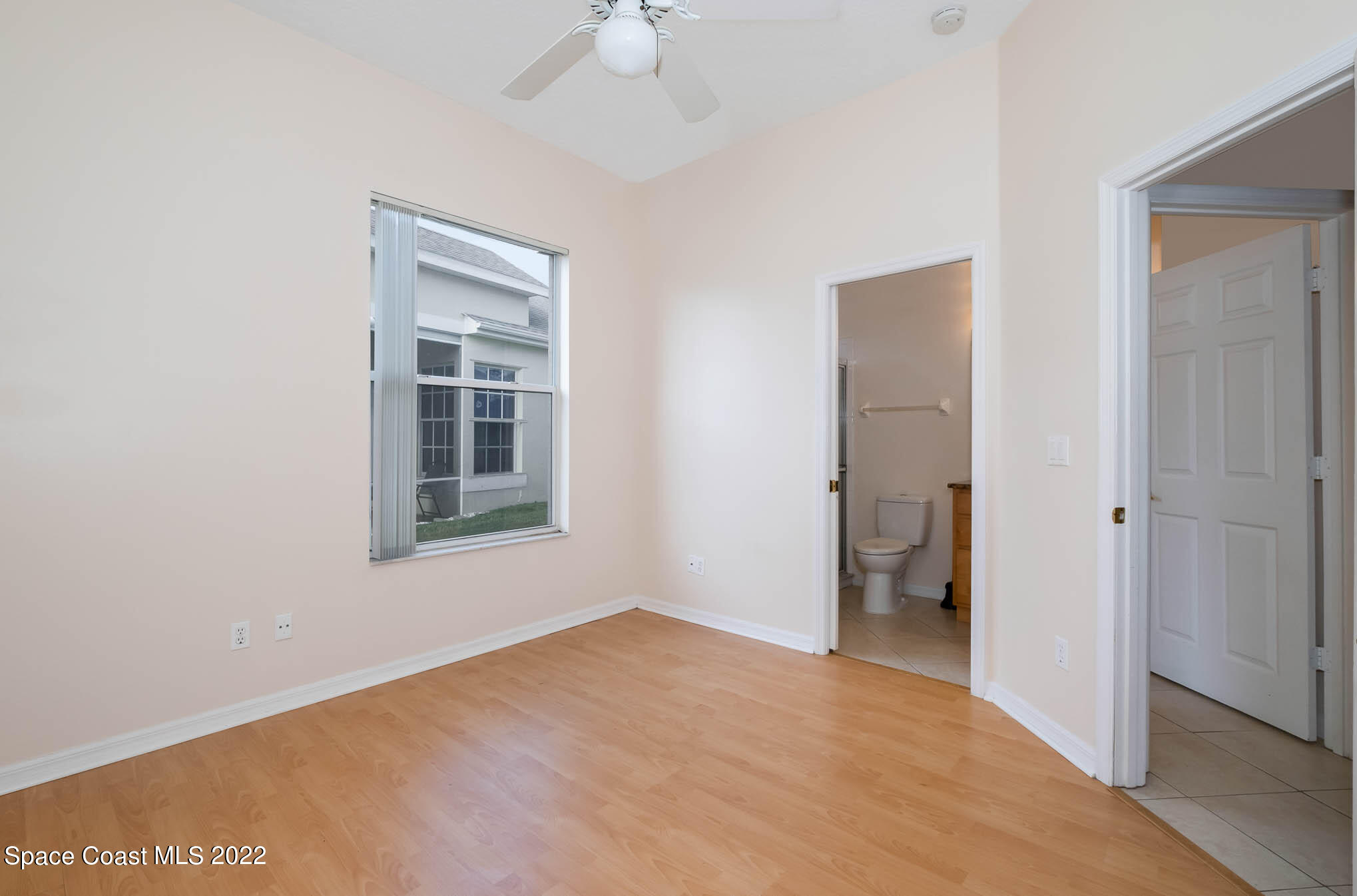 2364 Addington Circle Rockledge, FL 32955 - Photo 15 of 22 a view of an empty room with a window