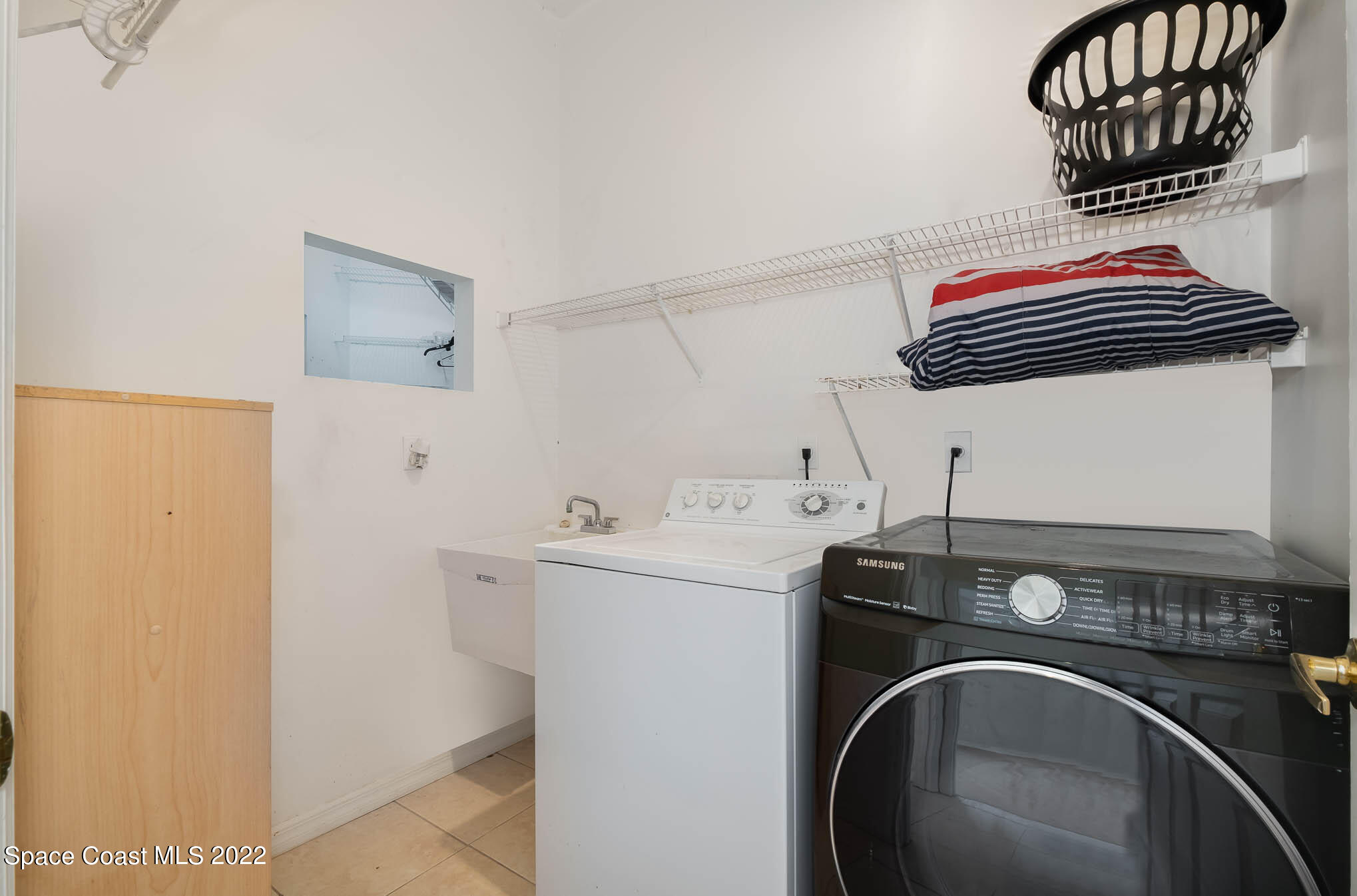 2364 Addington Circle Rockledge, FL 32955 - Photo 20 of 22 a utility room with dryer and washer