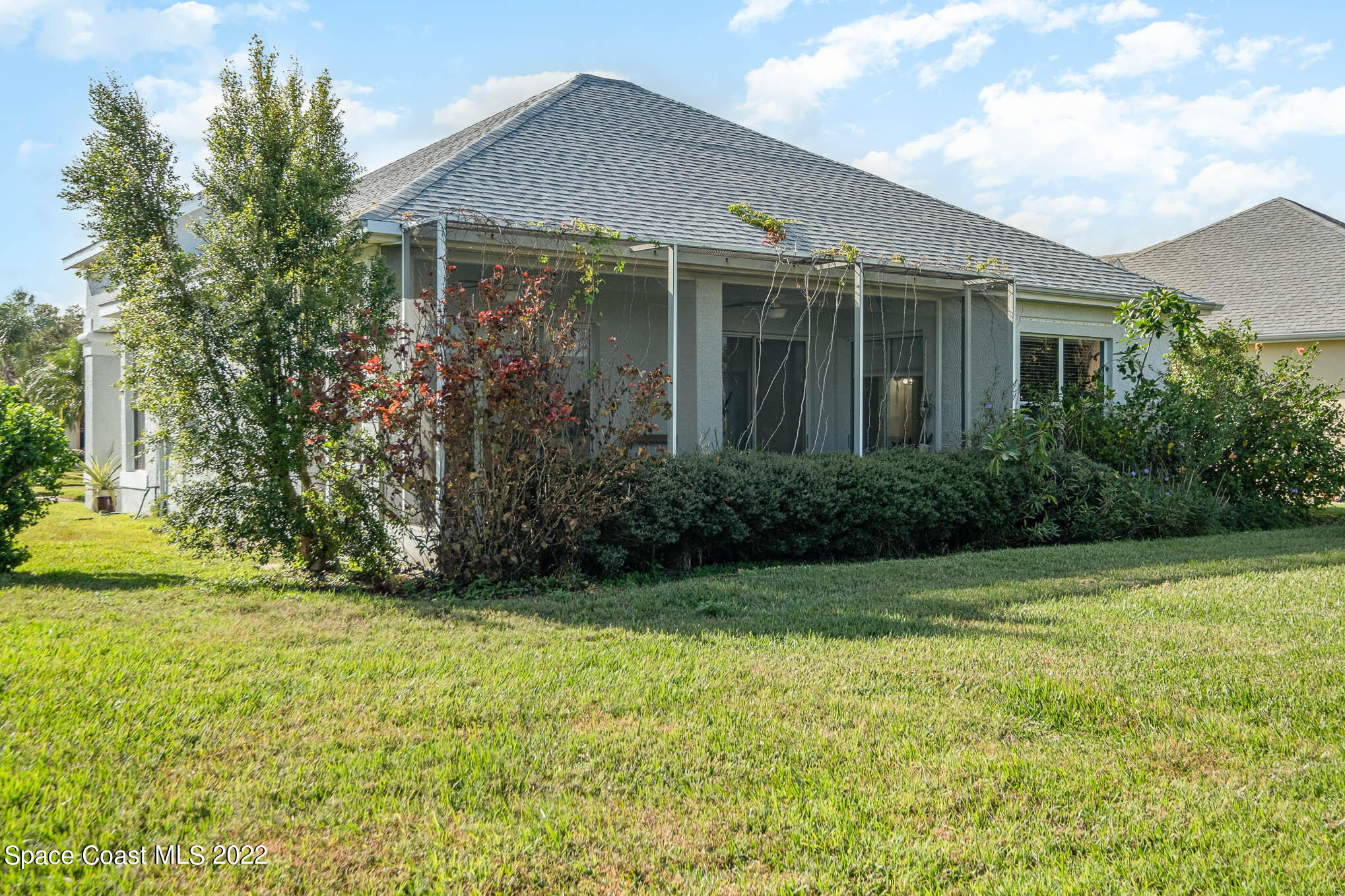 2364 Addington Circle Rockledge, FL 32955 - Photo 21 of 22 a front view of a house with a yard