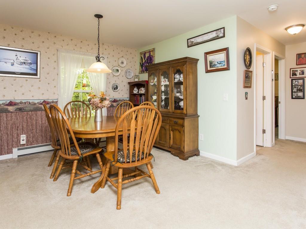248 Stevenstown Road Litchfield, ME 04350 - Photo 8 of 34 Dining Room view also shows flow to...