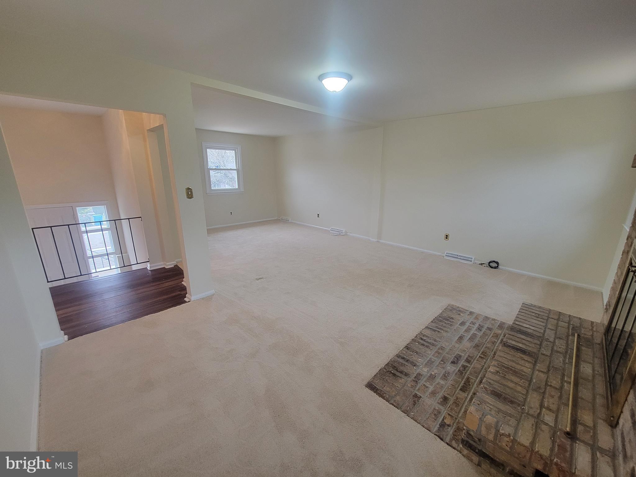 Super Spacious Family Room w/ Brick Fireplace