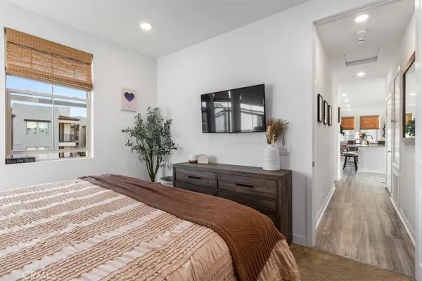 a bathroom with a double vanity sink toilet and shower