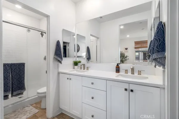a bathroom with a shower and a toilet