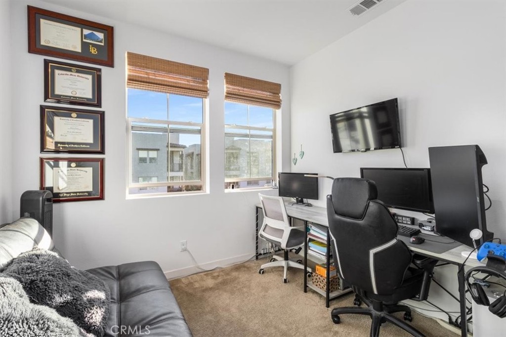 1201 Lasso Way Rancho Mission Viejo, CA 92694 - Photo 27 of 55 a livingroom with workspace and a window