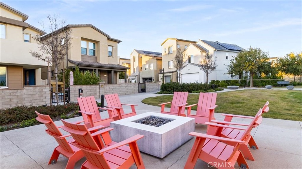 1201 Lasso Way Rancho Mission Viejo, CA 92694 - Photo 33 of 54 an outdoor space with lounge chair and a table