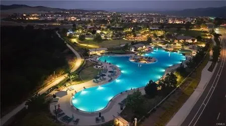 an aerial view of a house with a ocean view