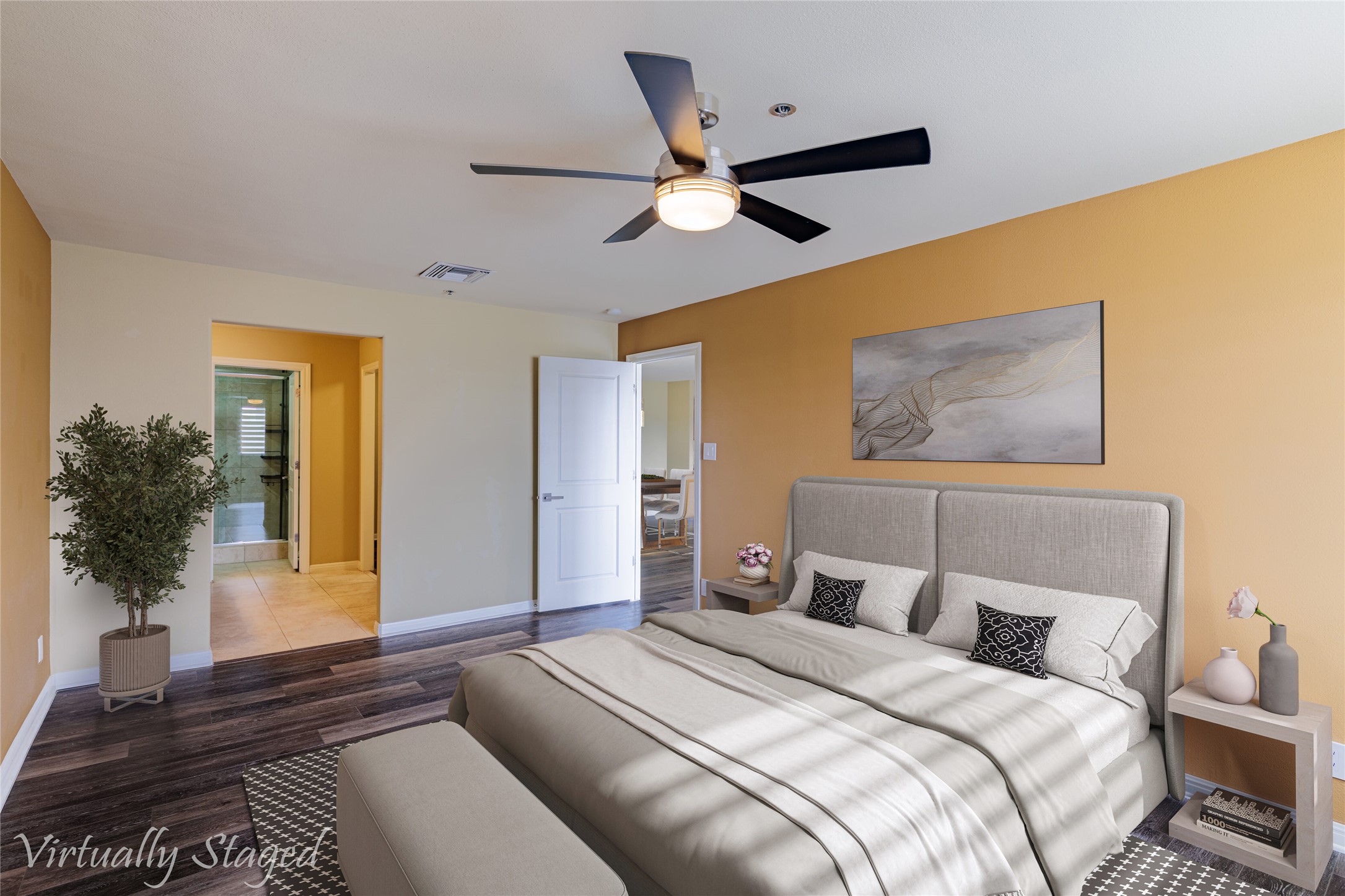 40 North Interstate Highway 35, Unit 6D3 Austin, TX 78701 - Photo 18 of 35 a bedroom with a bed and a potted plant